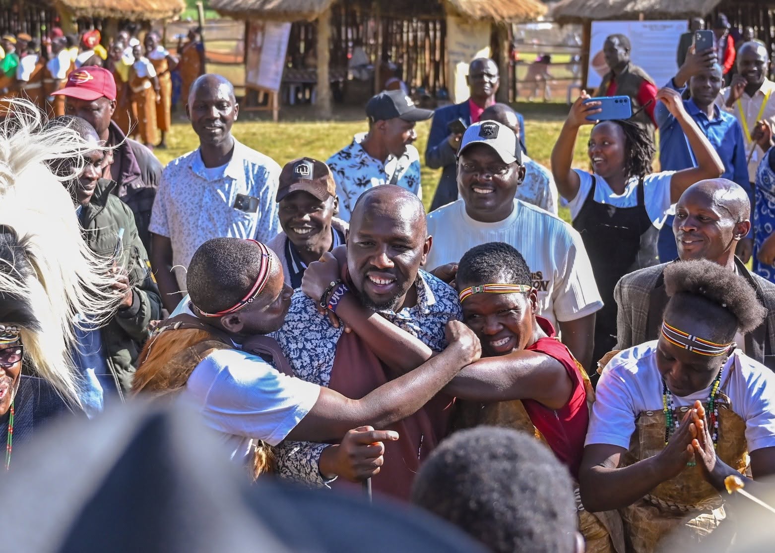 A joyful community moment with children and supporters